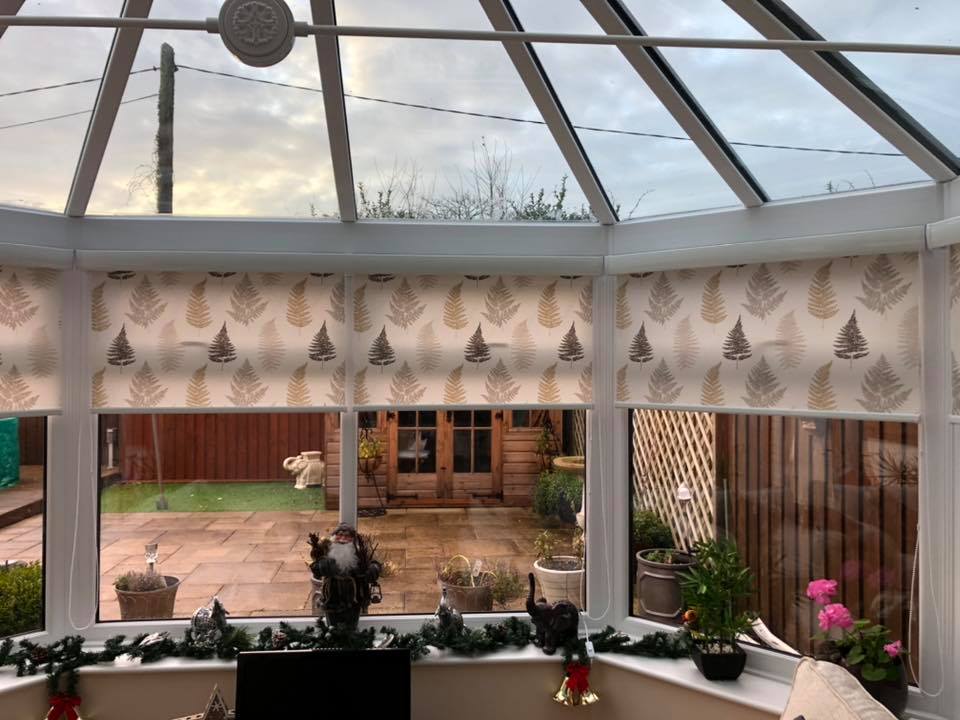 Senses roller blinds fitted in a conservatory